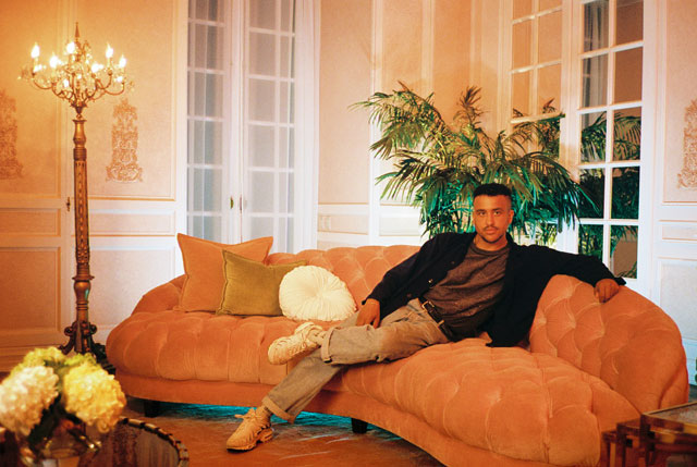 Matthew Dillon Cohen on a couch